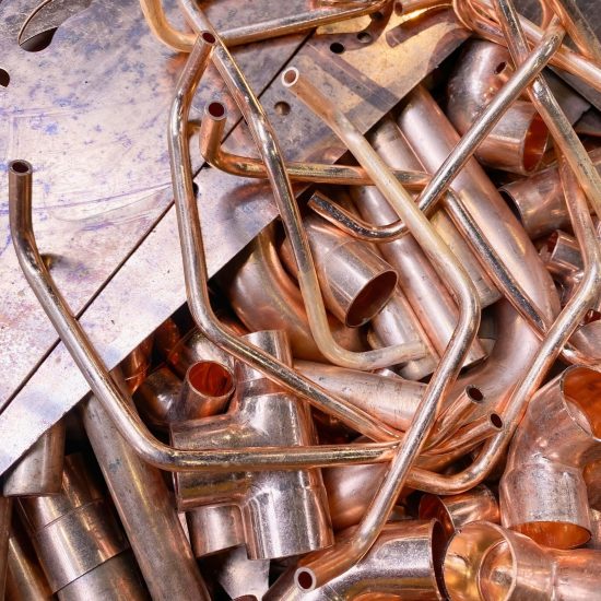 Scrap new copper tube and cuttings ready for recycling Scrap new copper tube and cuttings ready for recycling. High Quality Image.